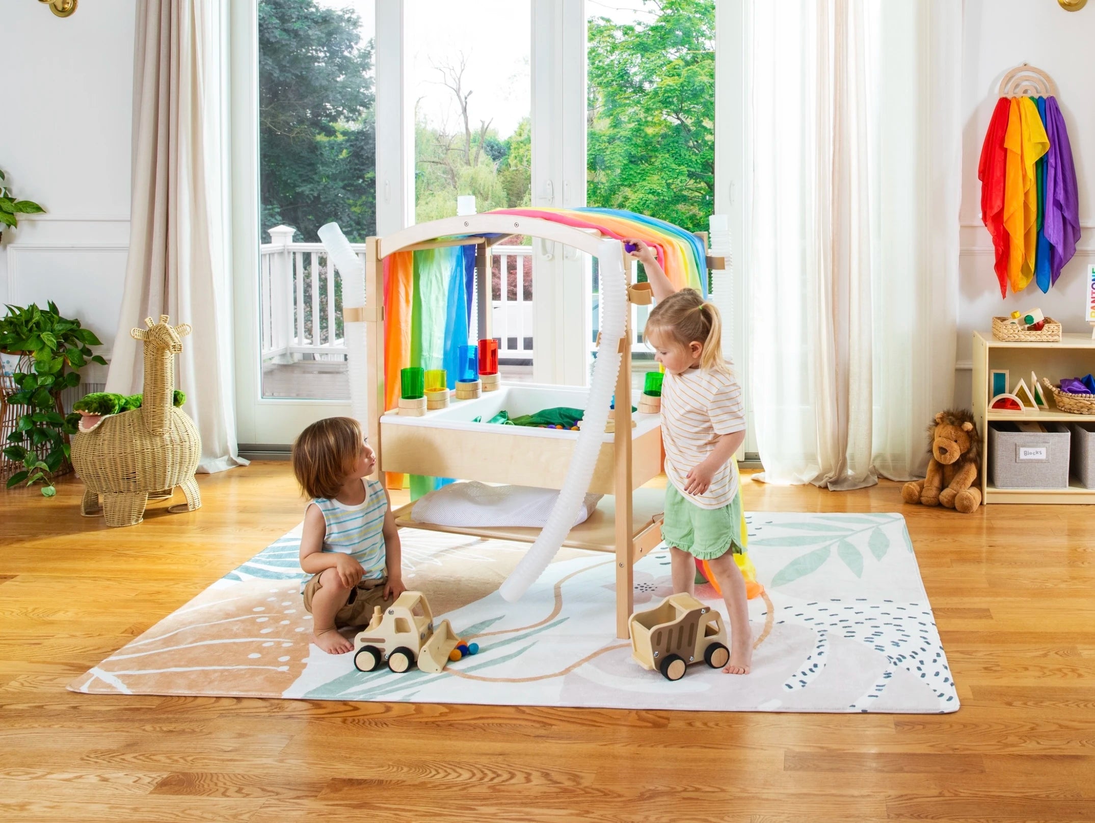Children playing at the Sensory System with Clips and Tubes