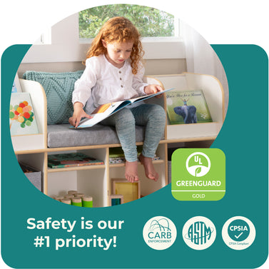A young girl sits on a bench, reading a book, surrounded by childrens books and safety certification logos, enjoying a peaceful moment in her cozy reading corner.