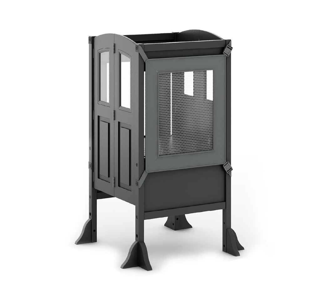 Black metal outdoor fire pit with mesh sides and decorative door-like panels, standing on four sturdy legs for stability. Perfect for cozy backyard gatherings.