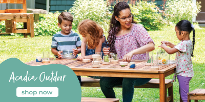 Family outdoors at a table with 'Acadia Outdoor' branding.
