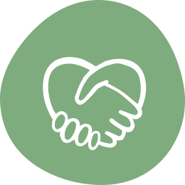 Two hands shaking, forming a heart shape with a white outline, symbolize partnership on a green circular background.