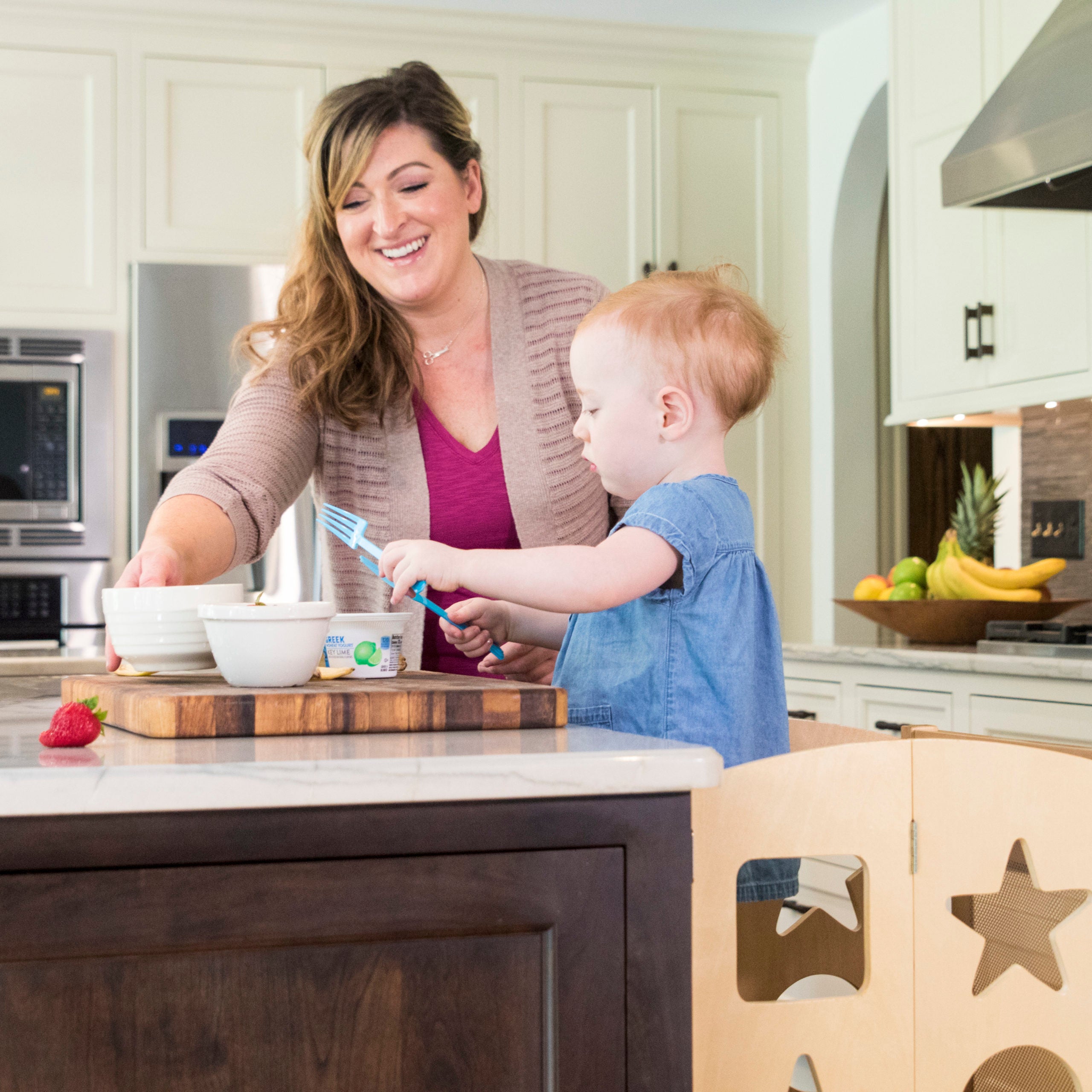 Learning in the Kitchen – 9 Skills Toddlers Learn When They Work in the Kitchen Using a Guidecraft Kitchen Helper