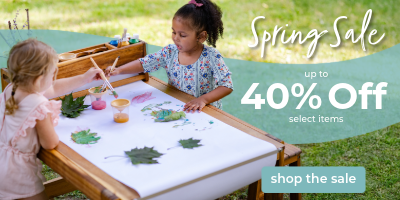 Two children at a table with art supplies, Banner for a spring sale