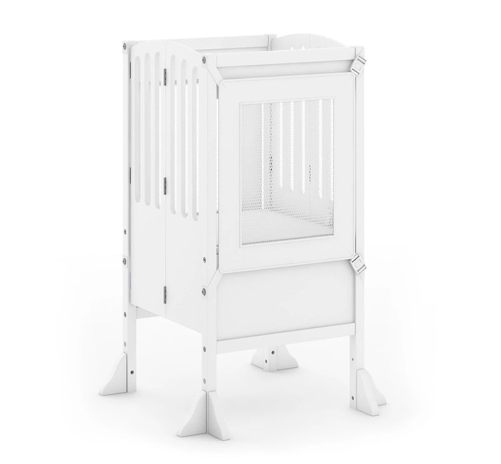 Modern white baby crib with mesh side panel and angled legs, featuring a sleek, contemporary design