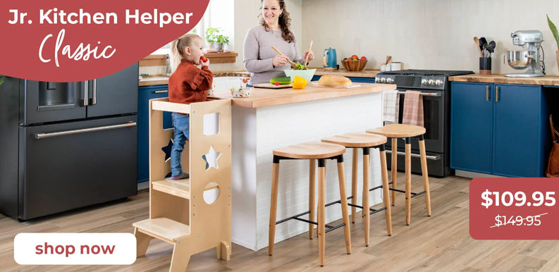 Kitchen with a Jr. Kitchen Helper Classic product displayed, showing a child using it. Promotional text for 'Kitchen Helper Jr. Classic product. Sale price $109.95. MSRP $149.95. Click to shop now.
