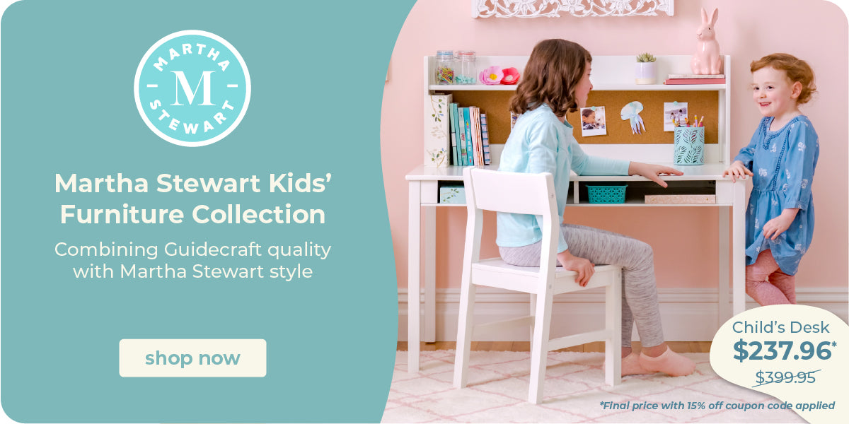 Promotional banner for the Martha Stewart Kids' Furniture Collection, featuring a child's desk setup with two children in a pink room. The left side has a teal panel with the Martha Stewart logo and text reading 'Martha Stewart Kids' Furniture Collection' and 'shop now'.