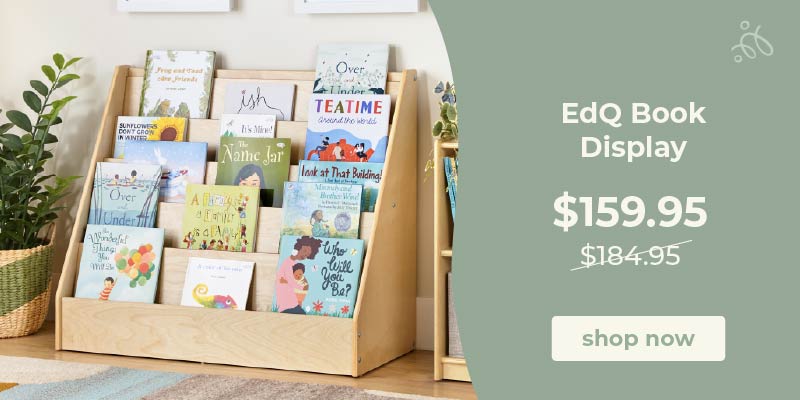 Wooden book display with children's books in a room setting, promotional text for EdQ Book Display. Click to shop $159.95 down from $184.95