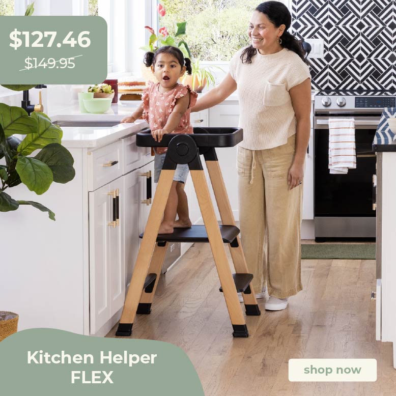 Woman and child using a kitchen helper  Flex stool in a home kitchen. Click to shop at $127.46 down from $149.95.