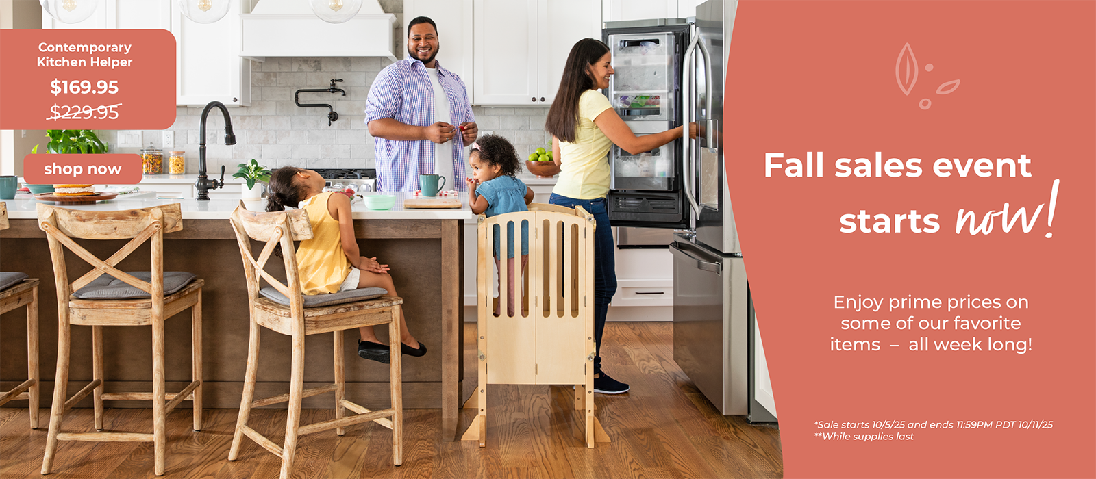 Family in a modern kitchen with the youngest child standing in a Guidecraft Contemporary Kitchen Helper Toddler Tower. Fall sales event text on an orange background