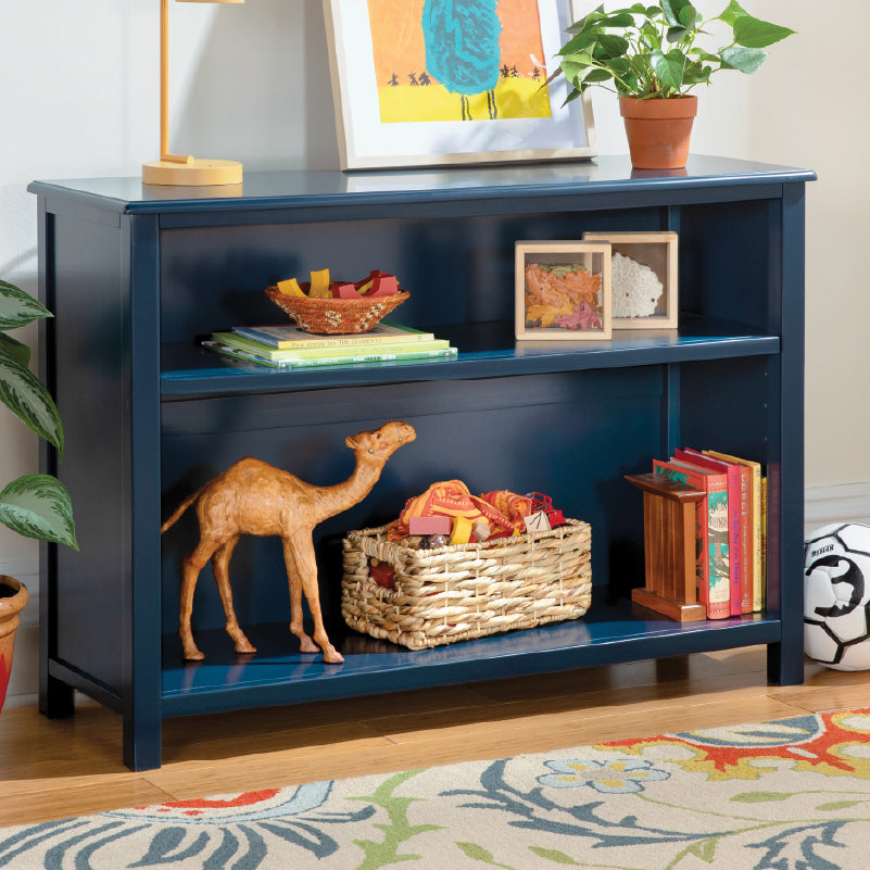 Dark blue shelf in kids room-Click to shop desks and shelves