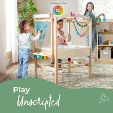 Children playing at a Sensory System table with a green sidebar and text about children's play.