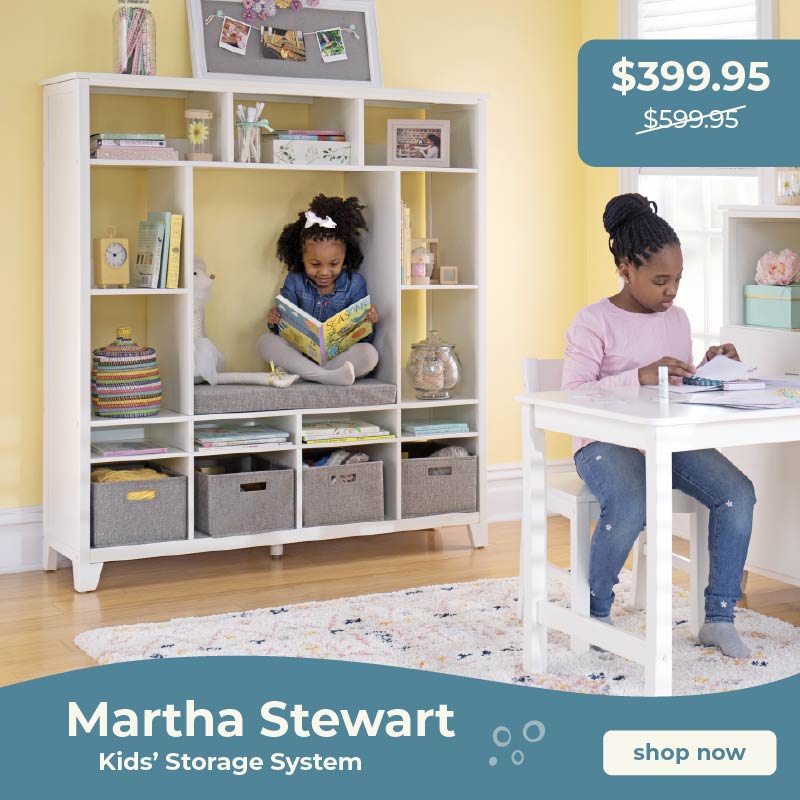 Martha Stewart Children's storage system with shelves and a desk, featuring a price tag $399.95, down from $599.95. Click to shop the storage system