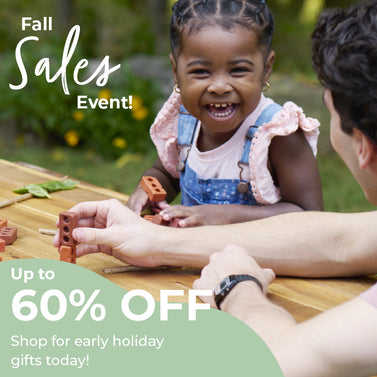 Happy child playing with Little Bricks-Save up to 30 percent on holiday gifts