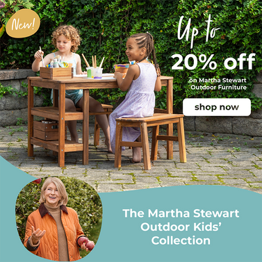 Advertisement for Martha Stewart Outdoor Kids' Collection with children at an acacia wood craft table outdoors.