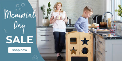 Woman and child in a kitchen with a Memorial Day sale banner on the left.