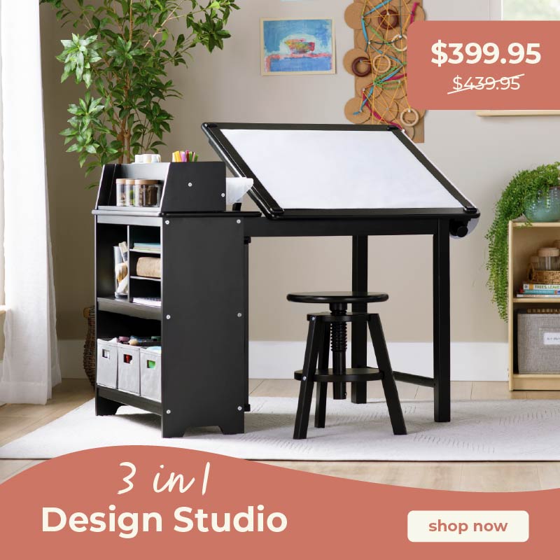 Black 3-in-1 design studio with white drafting table in a room setting. Click to shop the sale price of $399.95