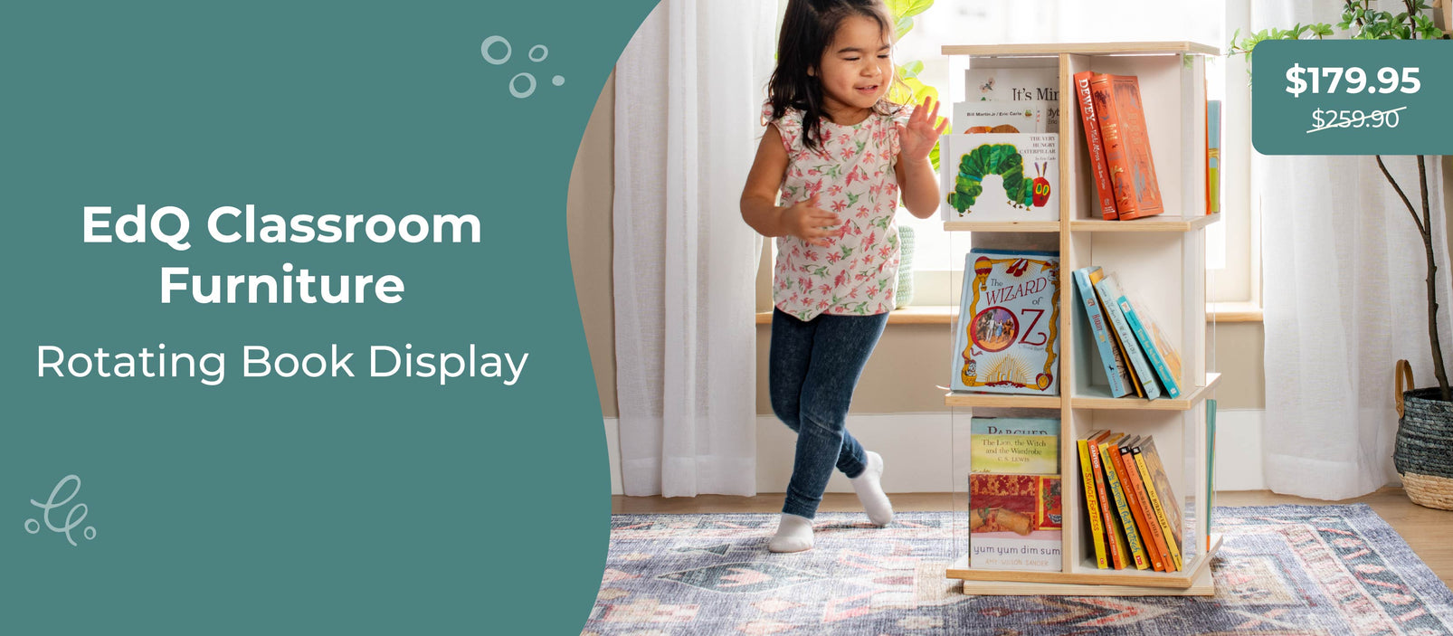 Child standing next to a rotating book display with books on a wooden shelf, promotional text for EdQ Classroom Furniture.