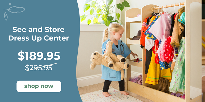 Child playing with a natural wood dress-up center with a price tag displayed on the left.