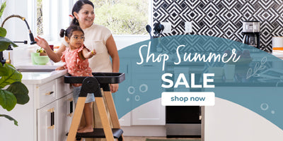 Woman and child in a kitchen with a 'Shop Summer Sale' banner overlay.